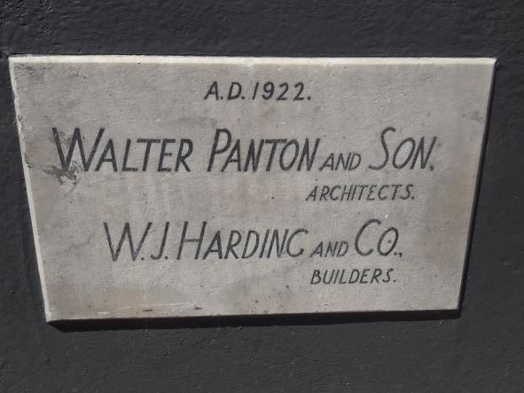 The Harcourts / Public Trust Office building plaque  