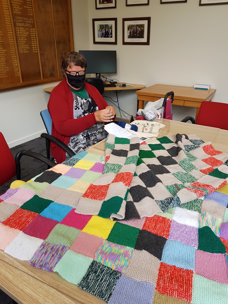Cushla Flannery with her peggy square blankets