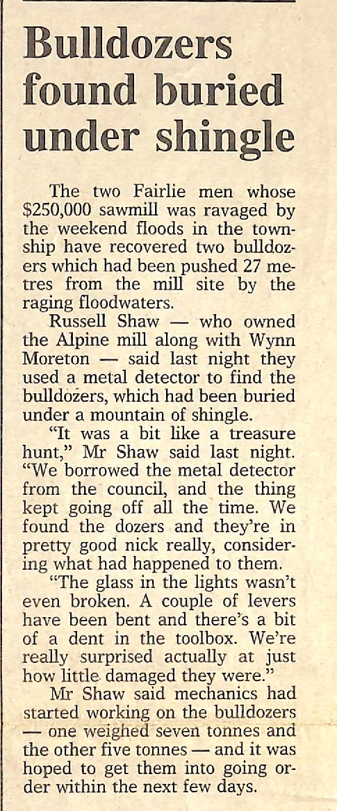 Bulldozers found buried under shingle