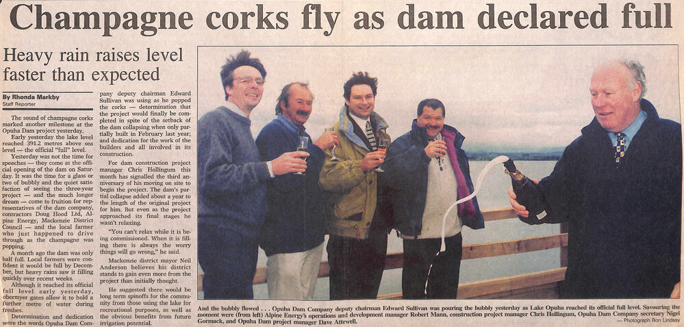 Champagne corks fly as dam declared full