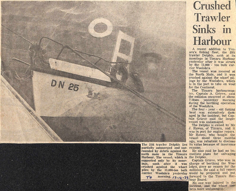 Crushed Trawler Sinks in Harbour