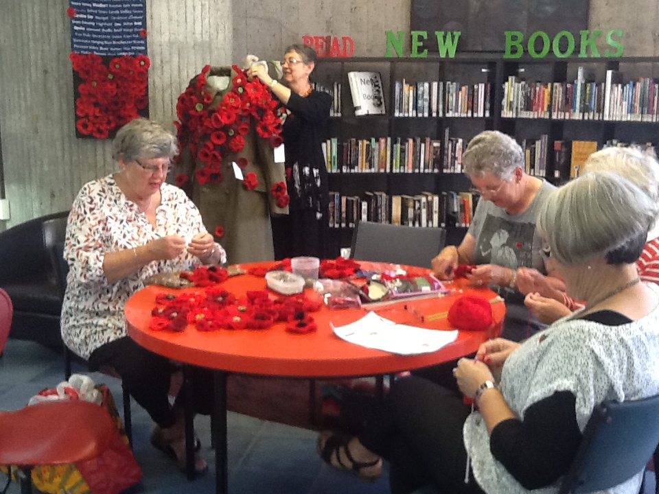 Aoraki Embroiderers' Guild making poppies