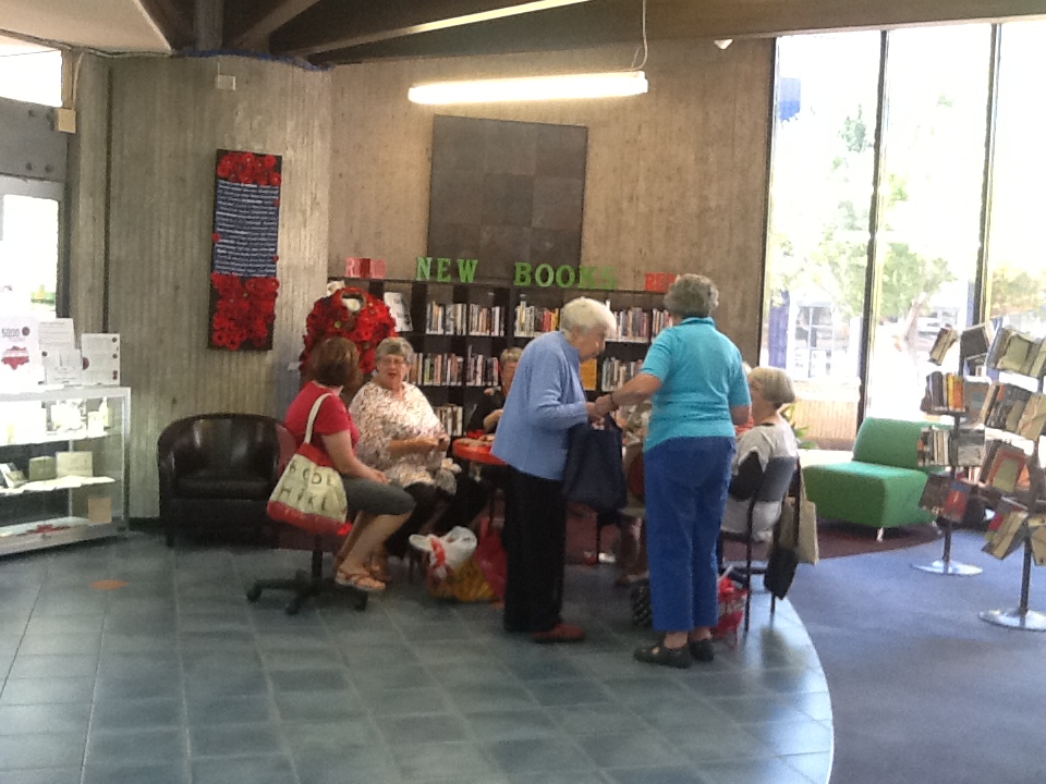 Aoraki Embroiderers' Guild making poppies