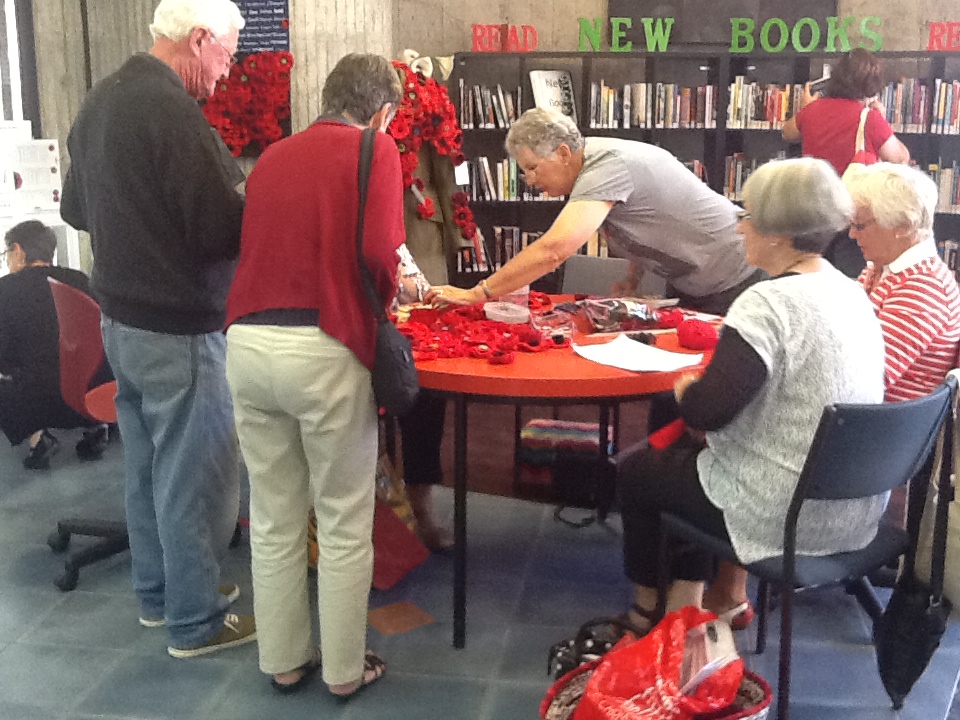 Aoraki Embroiderers' Guild making poppies