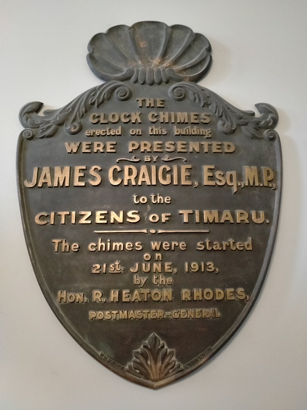 Clock chimes plaque on Timaru District Council building