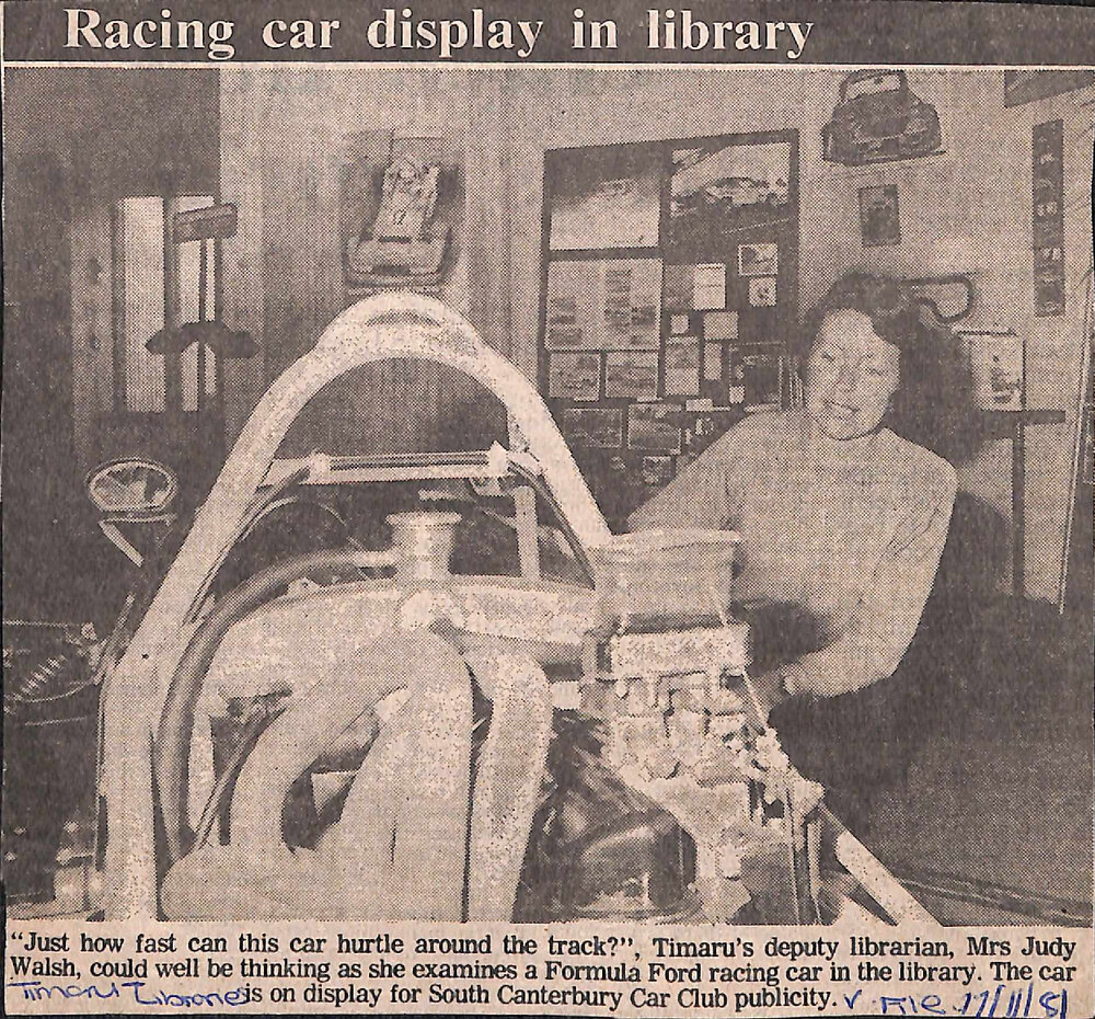 Racing car display in library