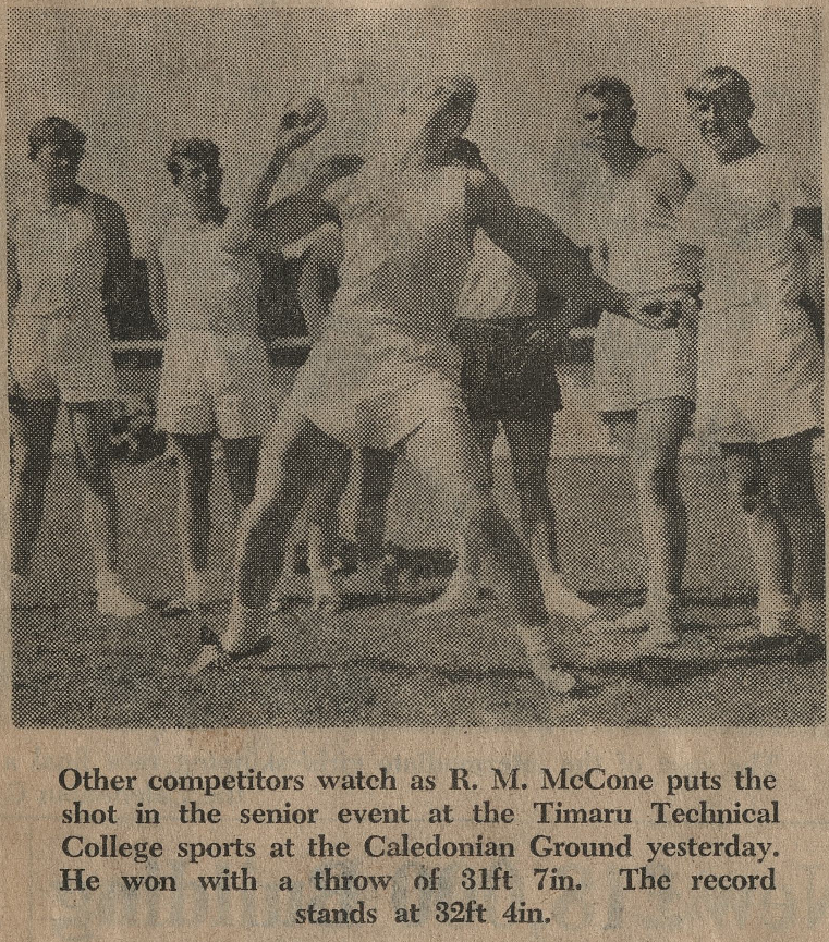 R M McCone puts the shot in the senior event at the Timaru Technical College Sports