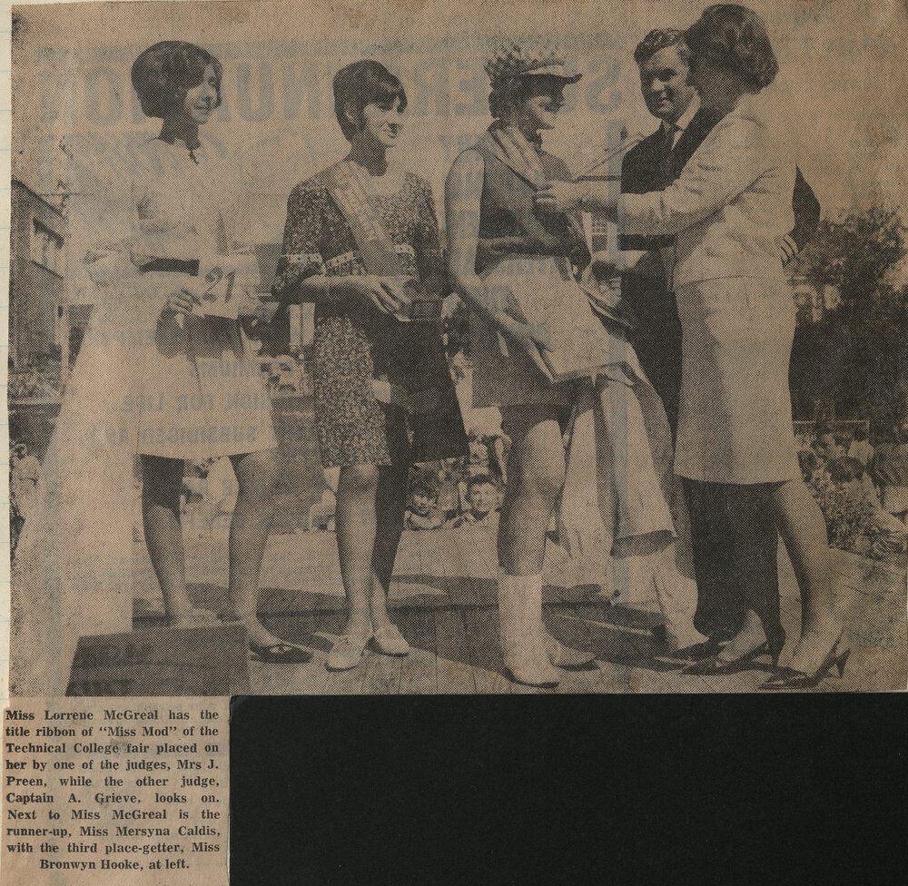 Miss Lorrene McGreal has the title ribbon of Miss Mod