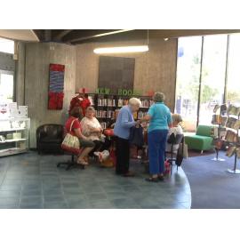 Aoraki Embroiderers' Guild making poppies
