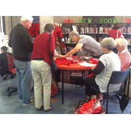 Aoraki Embroiderers' Guild making poppies