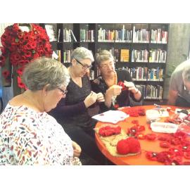 Aoraki Embroiderers' Guild making poppies