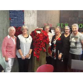 Aoraki Embroiderers' Guild with coat of arms made of poppies