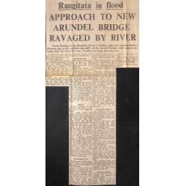 Rangitata in flood: Approach to new Arundel Bridge ravaged by river