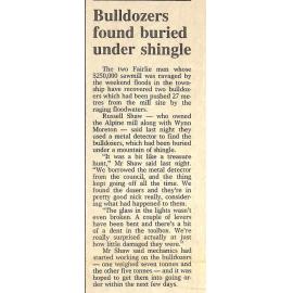 Bulldozers found buried under shingle