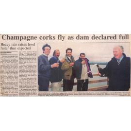Champagne corks fly as dam declared full