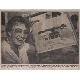 A segment of mural depicting the Landing Services Building