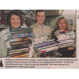 Shifting yet another armful of books