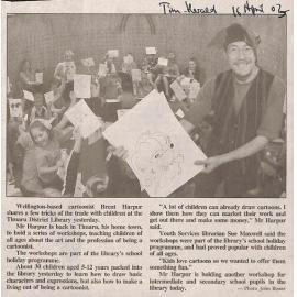 Wellington based cartoonist Brent Harpur shares a few tricks of the trade with children at the Timaru District Library