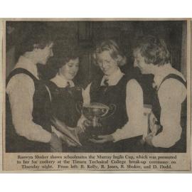 Raewyn Shuker shows schoolmates the Murray Inglis Cup