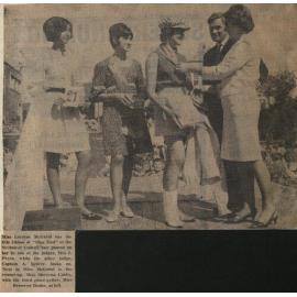 Miss Lorrene McGreal has the title ribbon of Miss Mod